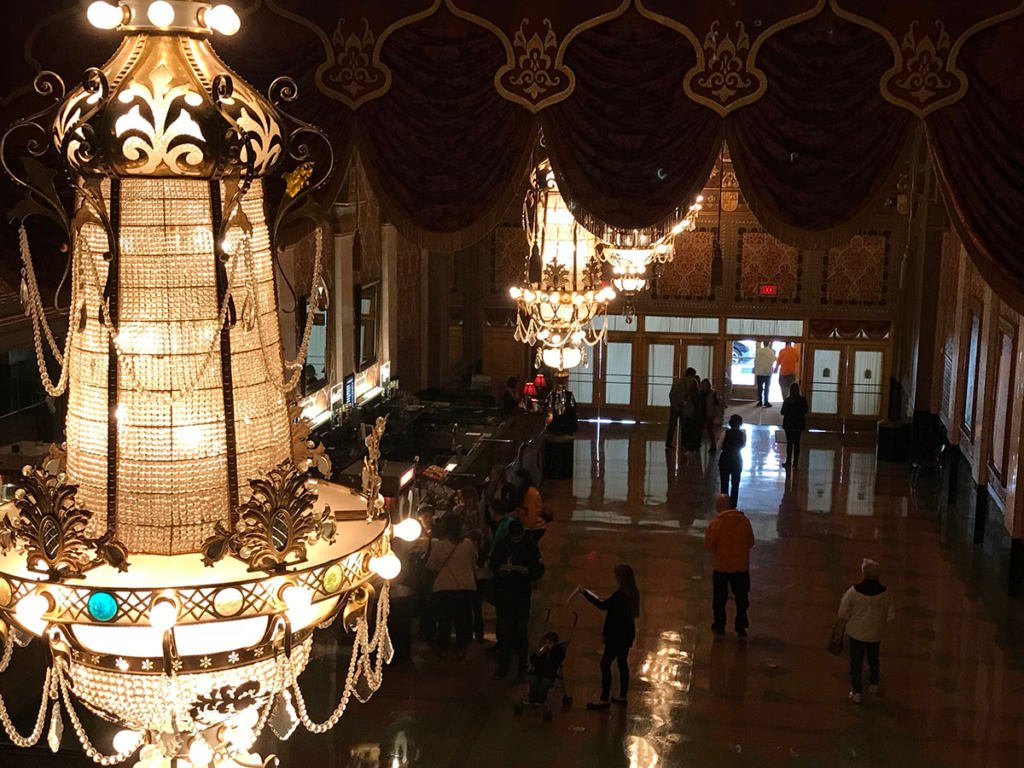 A large chandelier in a building  Description automatically generated with low confidence